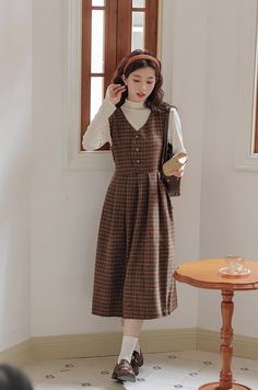 A two-piece set featuring a basic mock neck long sleeve sweater and a plaid pinafore dress with a button front, waist ties and midi skirt. S: 32" chest and waist, 41.5" lengthM: 33.5" chest and waist, 41.5" lengthL: 35" chest and waist, 41.5" length Plaid Dress Outfit, Fallen Leaves, Mock Neck Long Sleeve, Pinafore Dress, Dress Set, Overall Dress, Plaid Dress, Sweater Blouse, Cardigan Jacket