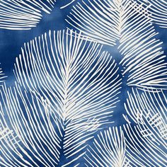 a blue and white palm tree print fabric with large leaves on the front, in various sizes