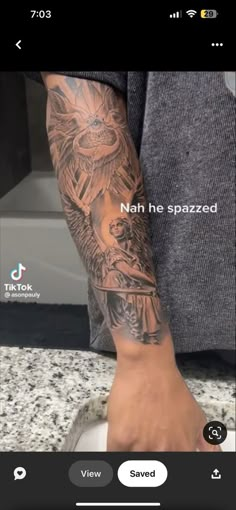 a man with a tattoo on his arm and foot is seen in this screenshot