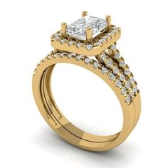 a yellow gold engagement ring with two rows of diamonds