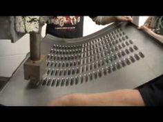 a person is working on something in a machine