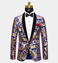 This exceptional royal blue and gold tuxedo jacket will have all eyes on you the minute you enter the room. The luxurious royal blue velvet and eye-catching gold sequins shimmer and shine making you the center of attention. Heads will be turning every time you wear it. It is the perfect choice for your next wedding, prom, or anniversary. This single-breasted royal blue and gold sequin dinner jacket is expertly handcrafted with high-quality materials. The lightweight design of this garment is ful Gold Tuxedo Jacket, Blue Tuxedo Jacket, Sequin Tuxedo, Prom Jacket, Gold Tuxedo, Embroidery Shawl, Prom Blazers, Shawl Collar Tuxedo, Blue Suede Loafers