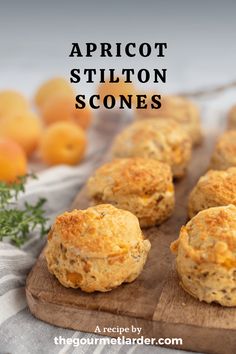 apricot stilton scones on a cutting board with oranges in the background