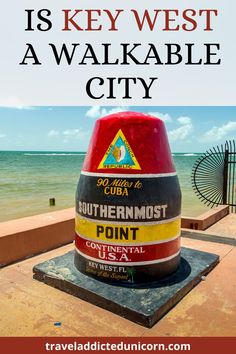 a red and yellow sign that says, what is key west a walkable city?