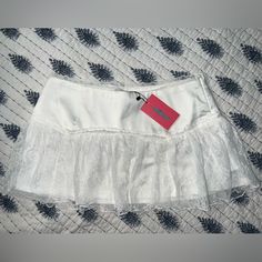 Brand New With Tags, Never Worn. Flirty Mini Skirt With Lace Trim, Flirty White Lined Skirt Bottoms, Flirty White Lined Skirt, Fitted Flared Skirt With Lace Trim, Fitted Lace Trim Flared Skirt, Black Lace Mini Skirt, Black Leather Mini Skirt, Ruffle Mini Skirt, Micro Mini Skirt