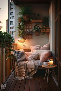 the balcony is decorated with potted plants and pillows