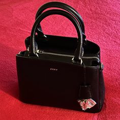 Medium Satchel W/ Detachable Strap For Shoulder Or Crossbody Wear. Color Black W/ Silver Hardware Detachable Strap Dkny Paige Satchel, Dkny Bags, Dkny Bag, Silver Hardware, Black Color, Satchel, Bag Lady, Silver, Women Shopping