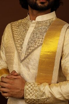 Gold pattu kurta featuring zari and cutdana hand embroidery on the neckline and sleeve hem. Paired with a dhoti pant and a kanduva. - Aza Fashions Kurta Set Men, Kurta Set For Men, Dhoti Pants, Kurta Set, Mandarin Collar, Aza Fashion, Online Design, Full Sleeve, Pure Silk