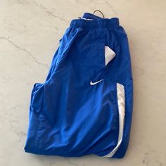 Brand New Condition Nike Track Pants Nike Blue Sweatpants With Pockets, Nike Blue Bottoms With Elastic Waistband, Blue Nike Bottoms With Pockets, Nike Track Pants, Blue Y2k, Y2k Nike, Pants Vintage, Nike Pants, Vintage Nike