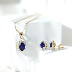 Product Details Crafted in solid gold, this Halo Pendant and Earring Set features an oval-cut lab-created blue sapphire, surrounded by a halo of moissanite, making it a timeless and elegant piece of jewelry that will make you stand out. Its classic design and high-quality materials ensure that this created blue sapphire jewelry set is a statement piece that you can cherish for years to come. Product Information SKU SHP-PENDANT012148435 Weight 4.54 gm (Approximate) LAB CREATED BLUE SAPPHIRE INFOR Blue Sapphire Jewelry Set, Sapphire Jewelry Set, Halo Jewelry, Pendant And Earring Set, Blue Sapphire Jewelry, Halo Pendant, Classic Jewelry, Sapphire Jewelry, Oval Cut