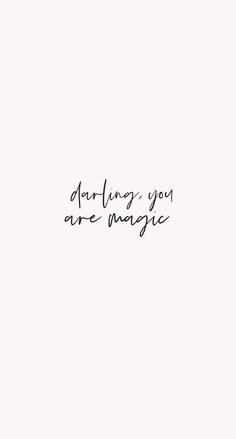 a black and white photo with the words, daring you are magic written in cursive writing