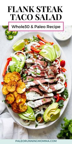 flank steak taco salad on a white plate