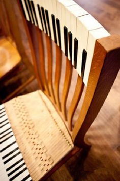 an old piano sitting on top of a wooden floor