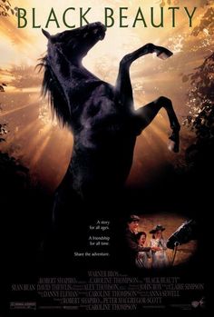 the movie poster for black beauty with a horse rearing it's hind legs