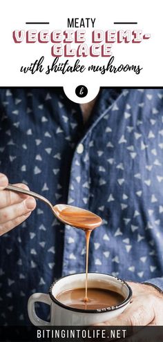 a man is holding a spoon full of hot chocolate and pouring it into a cup