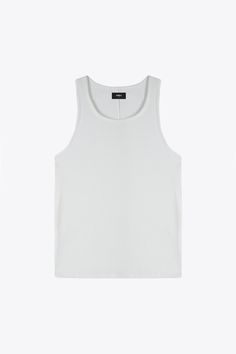 Introducing the Beater, the perfected essential vest. Crafted from 100% Ribbed Rayon Basic Sleeveless Everyday Vest, Basic Sleeveless Vest For Everyday, Basic Everyday Sleeveless Vest, Classic Sleeveless Tops For Everyday, Classic Cotton Vest Top, Solid Color Tank Vest For Everyday, Everyday Solid Color Tank Vest, Classic Tank Top For Layering, Basic Solid Color Vest For Everyday