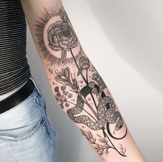 a person with a tattoo on their arm