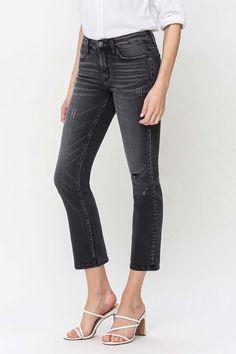 The Mid Rise Crop Slim Straight Jeans offer a blend of comfort and style for your everyday wear. Crafted from stretch denim, they provide ease of movement while maintaining their shape throughout the day. With a mid-rise waist, they offer a flattering fit that sits comfortably on the hips. The slight distressed detailing adds a touch of edginess to the look, giving it a modern and trendy vibe. Style: Casual Print / Pattern: Slight Distressed Silhouette: Straight Jeans Fit: Regular Embellishment: Mid-rise Washed Black Flare Jeans, Washed Black Mid-rise Flare Jeans, Mid-rise Washed Black Jeans For Fall, Casual Mid-rise Washed Black Flare Jeans, Casual Mid-rise Flare Jeans In Washed Black, Fall Mid-rise Washed Black Jeans, Fall Washed Black Mid-rise Jeans, Mid-rise Stretch Washed Black Bottoms, Stretch Mid-rise Cropped Jeans For Fall