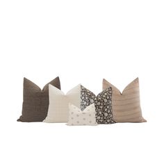 four pillows with different patterns on them