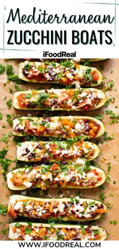 stuffed zucchini boats with cheese and herbs on top