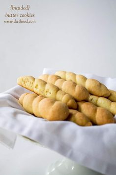 some cookies are sitting in a white bowl