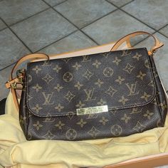 Condition Is Very Good/ Used But Very Well Loved - Purchased In 2016 - Smoke Free Home And Stored Well Size And Fit 9.5"W X 6.5"H X 2"D 7" Handle Drop 21" Strap Drop Been Sitting In Dust Bag And Box For A While. Strap And Chain Looks Brand New Elegant Gold Bag With Monogram Print, Elegant Shoulder Bag With Monogram Print And Coated Canvas, Elegant Shoulder Bag With Monogram Print, Tan Monogram Bag, Elegant Tan Monogram Bag, Classic Monogram Print Shoulder Bag, Lv Favorite, Cool Store, Better Love