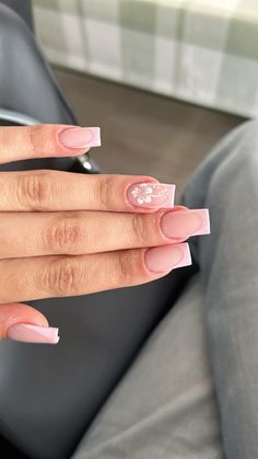 Pink french nails with hawaii flower Pink Acrylic With Flowers, Hawaii French Nails, Hawaii Inspired Nails Simple, Index Finger Nail Design, Pink French Tip With Flower Design, Basic Pink Nail Designs, Cute Hibiscus Nails, Pink French Design Nails, Pink Tip Nails With Flowers