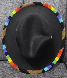 Black fedora hat with multicolored beads perfect for the summer season This hat fits all and can be worn anywhere Fedora Hat Summer, Beaded Hats, Fedora Beach, Black Fedora Hat, Indian Beadwork, Beaded Hat Bands, Black Fedora, Beautiful Days, Beaded Hat