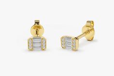 "Baguette Diamond Studs / Mini Diamond Stud Earrings / Tiny Baguette Diamond Earrings / Minimal Dainty Diamond Earrings by Ferkos Fine Jewelry Features ✔Made to Order ✔Gold Kt: 14K (also available in 18K) ✔Available Gold Color: Rose Gold, Yellow Gold, White Gold ✔Length & Width: 4.6MM x 3.45MM ✔Baguette Diamond: 6 pcs 2.x1.15 MM (for the Pair) ✔Round Diamond: 12 pcs 1 MM (for the Pair) ✔Number of Stones: 18 ✔Total CTW: 0.10 ✔ Diamond Color-Clarity: G Color SI Clarity ✔Ready to Ship in 1-3 Bu 14k Gold Baguette Earrings Fine Jewelry, Fine Jewelry 14k Gold Baguette Earrings, Classic Gold Earrings With Baguette Diamonds, Luxury Yellow Gold Baguette Cut Earrings, Classic Baguette Earrings For Gift, Yellow Gold Baguette Earrings For Gift, Gold Baguette Earrings Fine Jewelry, Elegant Baguette Yellow Gold Diamond Earrings, Baguette Yellow Gold Earrings As Gift