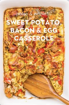 sweet potato, bacon and egg casserole in a white dish with a wooden spoon