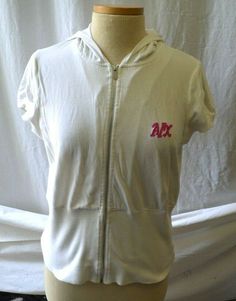 This white zip up hoodie has a pink trim in the hood and a pink A|X logo on the front.  Measurements  Length: 21" Shoulder to Shoulder: 16" Armpit to Armpit: 20" Payment is expected within 2 days of the auction end. We accept returns within 10 days if the item is not as described. Please contact us if you aren't happy with your purchase before leaving feedback. We are happy when you are happy. White Y2k Hoodie For Spring, X Logo, Y2k Sweater, When You Are Happy, Zipper Shorts, Short Sleeve Hoodie, Pink Trim, Hoodie Girl, Zip Up Hoodie