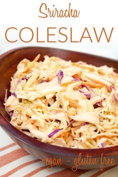 shredded coleslaw in a wooden bowl on top of a striped table cloth with text overlay