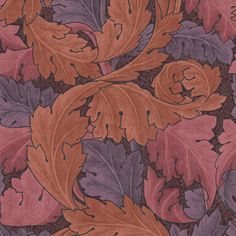 an orange and purple floral pattern on fabric with leaves in the middle, as well as flowers