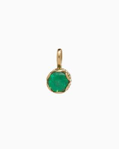 Crafted in 14K solid gold, the Princess Petroglyph Stone Pendant features a faceted green zircon stone encircled by intricate petroglyphs. Its unique design adds a touch of elegance to any outfit, and pairs wonderfully with our Princess Petroglyph Stone Studs. Metal: 14K solid gold Stone: Green zircon Dimensions: 16mm x 8mm Stone Size: 8mm Style #: GP160Gz Recycled Gold Gemstone Jewelry For May Birthstone, May Birthstone Faceted Yellow Gold Jewelry, May Birthstone Yellow Gold Faceted Jewelry, Faceted Yellow Gold Jewelry For May Birthstone, Yellow Gold Faceted Jewelry For May Birthstone, Luxury 14k Gold Emerald Necklace For May Birthstone, Gold Tsavorite Emerald Necklace For May Birthstone, 14k Gold Gemstones For May Birthstone, Heirloom Emerald Gemstone Jewelry