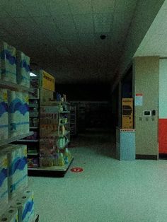 an empty grocery store filled with lots of boxes