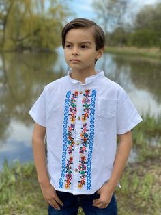 Beautiful Traditional Guayabera for Boys. This elegant button up Shirt is perfect for a special occasion such as First Communion, Baptism, Weddings, etc. Casual Traditional Fit Shirt For Summer, Multicolor Embroidered Tops With Buttons For Summer, Summer Tops With Multicolor Embroidery And Buttons, Traditional Blue Shirt For Summer, Traditional Blue Summer Shirt, Traditional Fit Cotton Shirt For Summer, Casual Traditional Fit Summer Tops, Traditional Short Sleeve Shirt With Multicolor Embroidery, Traditional Fit Embroidered Shirt