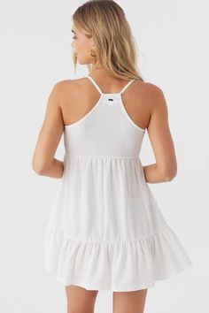 Sweet and flowy woven mini dress that features a solid color design, racerback detail and front tie closure. O'Neill Women's mini dress 25" In length Solid color wash Empire waist with bodice keyhole Tunneled spaghetti straps at keyhole Racerback 95% Polyester, 5% Elastane White Smocked Back Mini Dress For Beach, Casual Halter Neck Sundress For Daywear, Solid Color Mini Dress With Smocked Back For Summer, Casual Halter Neck Mini Dress With Tie Back, Flowy Mini Length Tops For Beach, Breezy Mini Dress For Daywear, Casual Mini Sundress With Tie Back, Casual Mini Length Sundress With Tie Back, White Casual Mini Dress With Tie Back