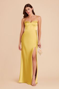 Jessica is our matte satin bridesmaid dress with a bustier bodice and high slit to show some leg. Available in Sunflower Yellow. Shop Birdy Grey! Va va voom! With a bustier bodice, The Jessica is meant to turn heads. | Sunflower Yellow Bridesmaid Dress Matte Satin Size 2XL | Birdy Grey Jessica Single Bridesmaid, Yellow Bridesmaid Dress, Yellow Bridesmaid, Satin Bridesmaid Dress, Yellow Bridesmaid Dresses, Birdy Grey, Grey Bridesmaid Dresses, Sunflower Yellow, Satin Bridesmaid Dresses