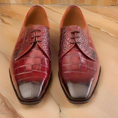 Classic Crocodile Embossed Red Wine Patina Derby Shoes for Men - Handmade Luxury Leather Dress Shoes  Product Description Classic Crocodile Embossed Design: Premium red wine patina finish, creating a bold and elegant look. Handmade Luxury Leather: Crafted from top-quality leather, offering durability and long-lasting wear. Sophisticated Men's Derby Shoes: Perfect for formal events, business attire, or smart casual outfits. Comfort and Style Combined: Features cushioned insoles and a sleek design Events Business, Mens Derby Shoes, High Ankle Boots, Brown Leather Ankle Boots, Oxford Dress Shoes, Embossed Design, Leather Dress Shoes, Smart Casual Outfit, Black Leather Ankle Boots