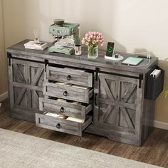 a table with drawers and a phone on top