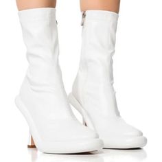 The Azalea Wang Tarrow Stiletto Pu Bootie In White Features A Lightweight Platform Bubble Sole, A Slim Stiletto Heel, And A Faux Leather Upper. Complete With A Tonal Inner Ankle Zipper. Pair These Fresh Booties With A Utilitarian Jumpsuit For A Chic Going-Out Look. Brand New With Box All Measurements Approximate From Size 7.5 - 4” Heel Height - 1.5” Platform Height - 7.5” Shaft - 9.5” Shaft Circumference - Faux Leather Upper - Almond Toe - Bubble Sole - Stiletto Heel - Imported White Faux Leather Square Toe Heeled Boots, White Faux Leather Heeled Boots With Square Toe, Spring Heels With Padded Ankle In Synthetic, Fitted Faux Leather Booties For Fall, Fitted Ankle-high Platform Heeled Boots, Platform Heels With Square Toe, Fitted Platform Heels With Square Toe, Fitted Ankle Boot Heeled Boots With Platform, Fitted White Faux Leather Boots