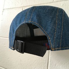 "Handmade cap with pencil holder✏️ ✎DETAILS: 5 panel cap is handmade from 10 oz indigo denim ( made in USA). Sewn with golden heavy duty top stitch thread. Patch, brim and hardware made in the USA. The brim is not a bought plastic insert. Brims are handmade here in house, they are shorter and softer than typical hats. They are super comfortable yet still completely hand washable and incredible durable. Hand built by two human makers ( apes/April & bird/Rich) with love, care and pride here in Adjustable Denim Baseball Cap With Flat Bill, Denim Blue Adjustable Snapback Hat, Adjustable Denim Trucker Hat Snapback, Adjustable Denim Snapback Trucker Hat, Everyday Denim Hats One Size Fits Most, Casual Adjustable Hats, Casual Everyday Cap, Adjustable Snapback Hats For Everyday Use, Monogram Baseball Hat