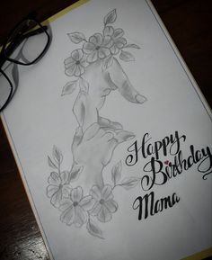 a birthday card with flowers on it and the words happy birthday mama written in black ink