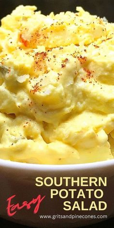 a bowl filled with mashed potatoes on top of a table