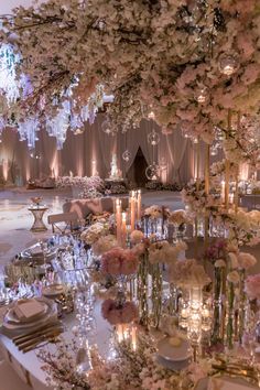 an elegant wedding setup with flowers and candles