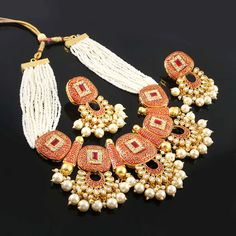 This is a stunning handmade choker necklace perfect for high end Jewelry Collector, a keeper in Traditional Vintage Indian/Pakistani Bridal jewelry and a Luxury Gift for your Daughter, Sister or Wife on Wedding or Anniversary. Perfect for any type of occasions, weddings And celebrations and a beautiful & memorable gift for weddings and special occasions. Description  Item Code:- L Gold Plated Fine Kundan & Pearl Cluster Choker Necklace Necklace Measures- Adjustable with a Dori/Cord Earring Measures- 62x45mm approx Quantity- One Necklace Set Please see more different designs here:- https://www.etsy.com/in-en/shop/LUCKYJEWELSART?ref=seller-platform-mcnav I make every item of my collection with a lot of love and care, I pay attention to every detail.  You are more than welcome to contact me f Luxury Kundan Necklace For Navratri Ceremonies, Luxury Heavy Kundan Necklace For Navratri, Luxury Pearl Kundan Necklace For Celebrations, Luxury Festive Choker Temple Necklace, Luxury Kundan Temple Jewelry Necklace For Navratri, Luxury Necklace For Navratri Celebration, Luxury Pearl Necklace With Meenakari, Luxury White Meenakari Necklace, Luxury White Necklace With Meenakari