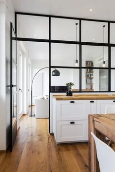 the kitchen is clean and ready to be used as a dining room or living room