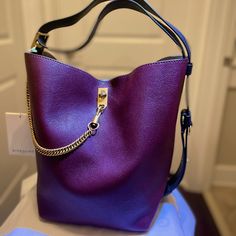 Givenchy Aubergine Medium Bucket Bag. Nwt. Beautiful Bucket Bag. My Husband Bought For Me Two Years Ago And Never Had The Heart To Say It Wasn’t Exactly My Style. It’s A Beautiful Fancy But Casual Bag. Please Message Me With Questions. Purple Bucket Shoulder Bag With Detachable Strap, Purple Top Handle Shoulder Bag With Gold-tone Hardware, Luxury Purple Bag With Branded Hardware, Purple Evening Bags With Removable Pouch, Designer Purple Bag With Gold-tone Hardware, Purple Crossbody Shoulder Bag With Branded Hardware, Designer Purple Shoulder Bag With Removable Pouch, Designer Purple Bags With Gold-tone Hardware, Purple Shoulder Bag With Detachable Handle For Evening