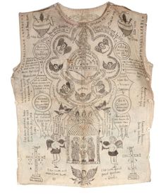 an old piece of cloth with various symbols and words on it's back side