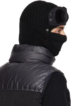 Knit extrafine merino wool and nylon taffeta balaclava in black. · Press-stud panel with acetate lenses at face · Logo flag and rolled edge at collar Face masks and face coverings are final sale and are not eligible for return or exchange. Supplier color: Black Black Windproof Full Face Balaclava, Black Full Face Balaclava For Cold Weather, Black Balaclava For Skiing In Winter, Black Skiing Balaclava For Winter, Black Winter Skiing Balaclava, Black Balaclava For Cold Weather, Face Logo, C P Company, Face Coverings